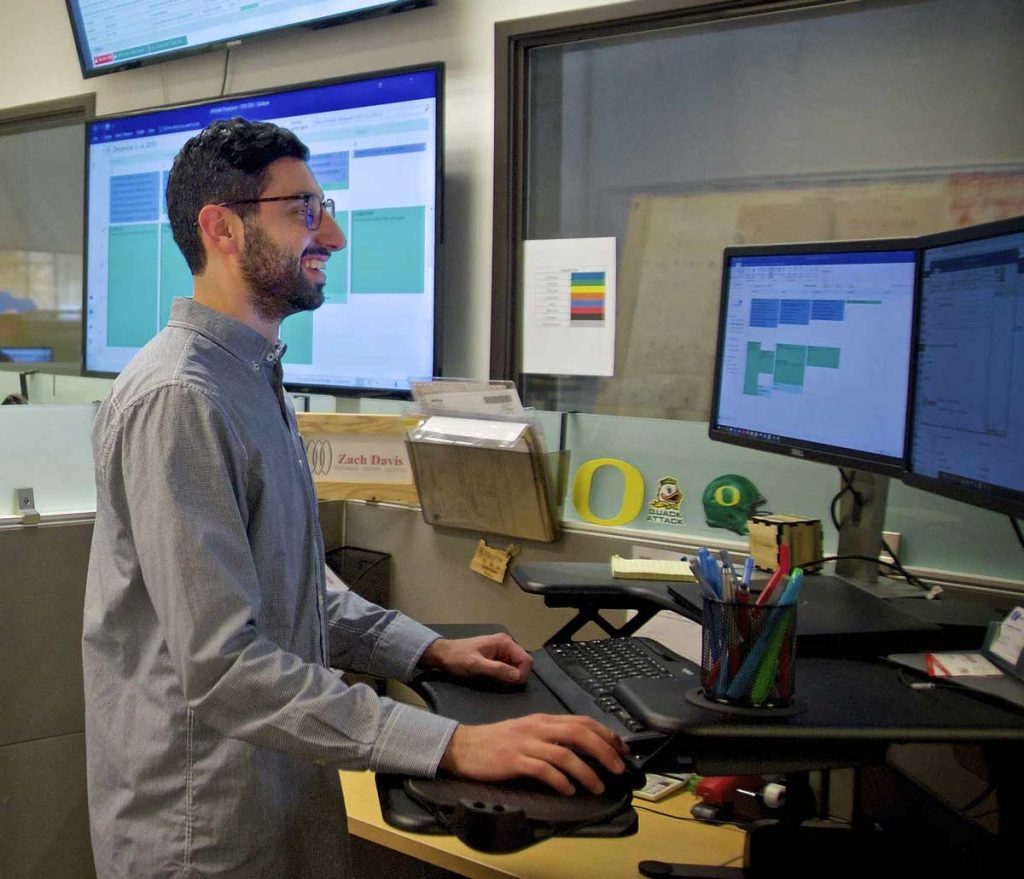 transpak-engineer-at-workstation-processing-tasks