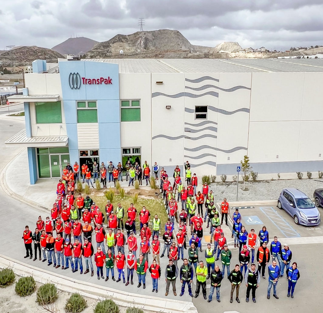 transpak-tijuana-team-in-front-of-facility