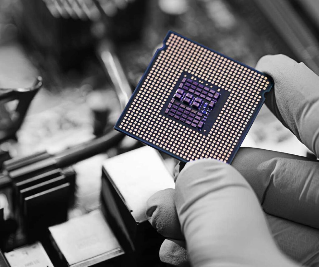 Person holding a computer chip.