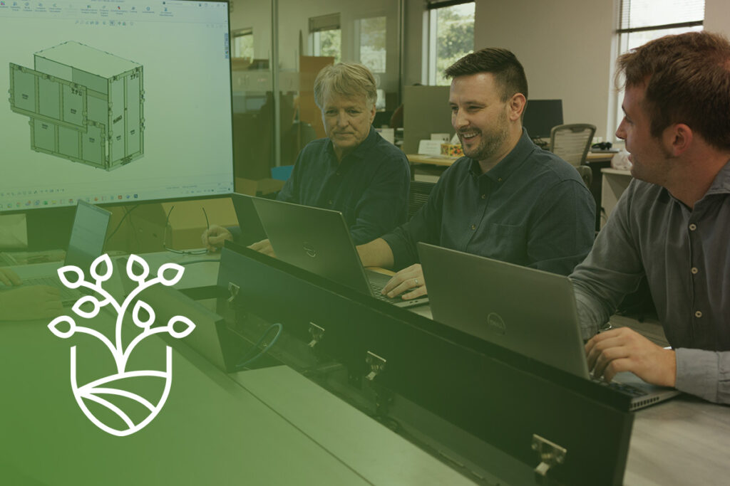 transpak team and leadership reviewing carbon calculator reports